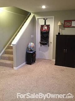 Excellent Living Space
						:
						Door leads to play room, laundry and a large storage area!