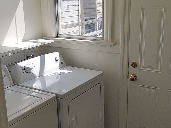 Full size washer and dryer included in unit.