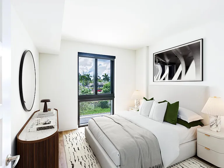 Relax in refined comfort_bedrooms at Modera Aventura offer bright spaces and tranquil views.