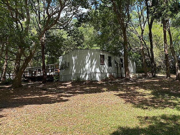 Add. Home before tree remova