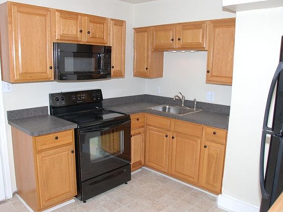 Newly Designed kitchen w/new Refrig, MW and Glass top stove, new counter