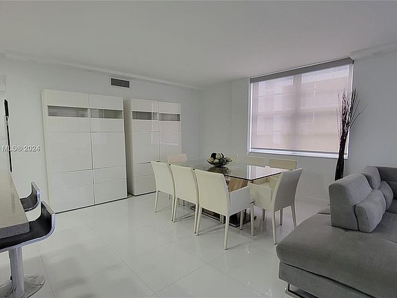 3rd image of 9500 W Bay Harbor Dr APT 3H