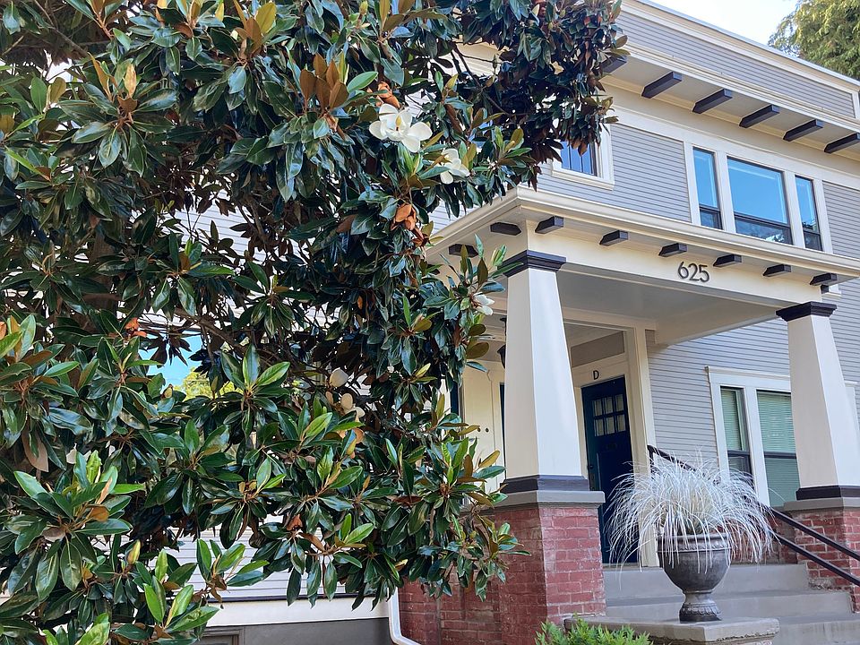 Vintage Styling.. entrances are up off the street, with shared covered front porches.