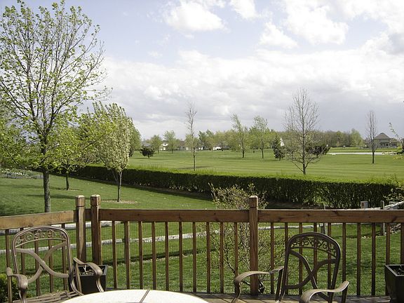 Beautiful view of 9th and 18th fairways along with pond