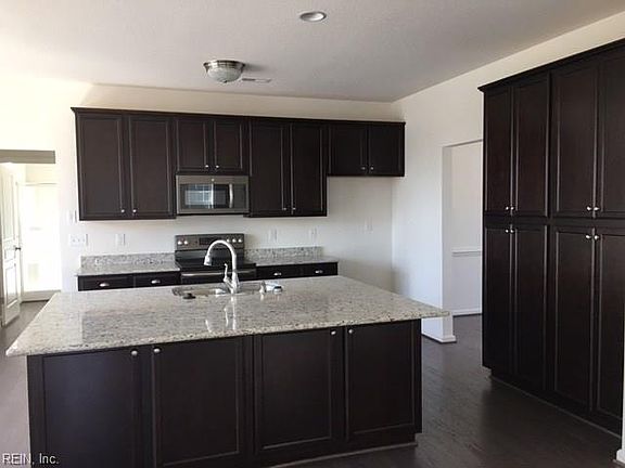 Similar cabinets and granite to be installed. 