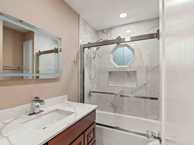 Upstairs renovated rainshower Bathroom