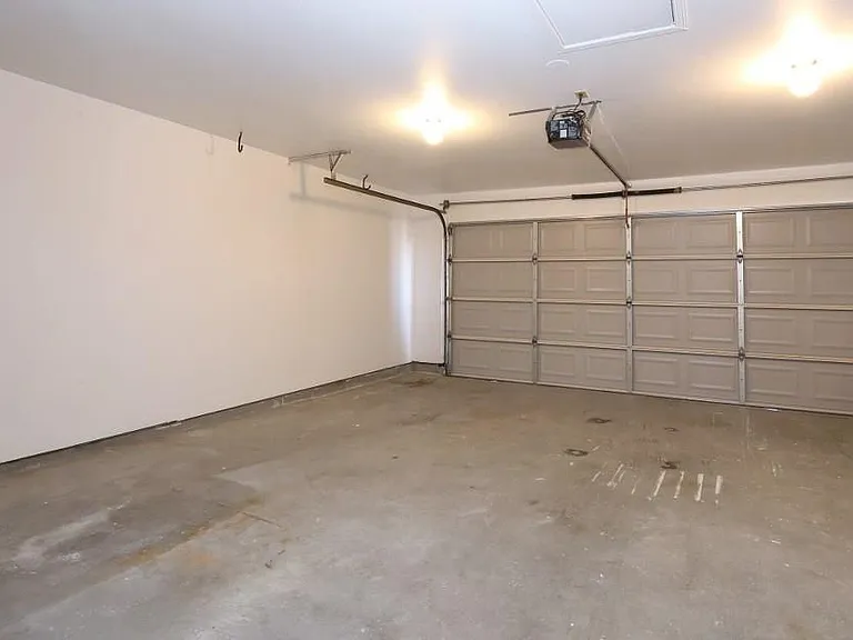 Garage with myQ, bike stand and EV wallplug