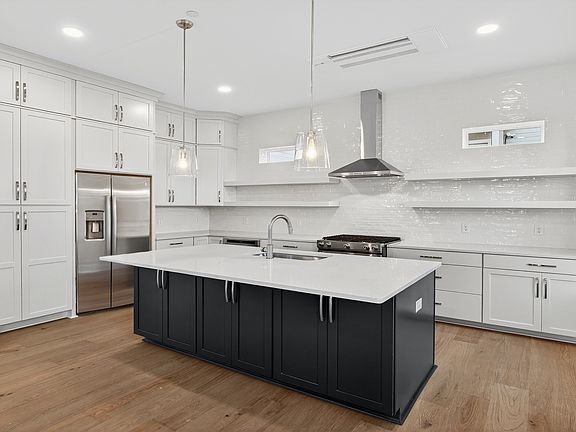 The Seabrook kitchen offers a large center island, designer finishes, and open flow for entertaining