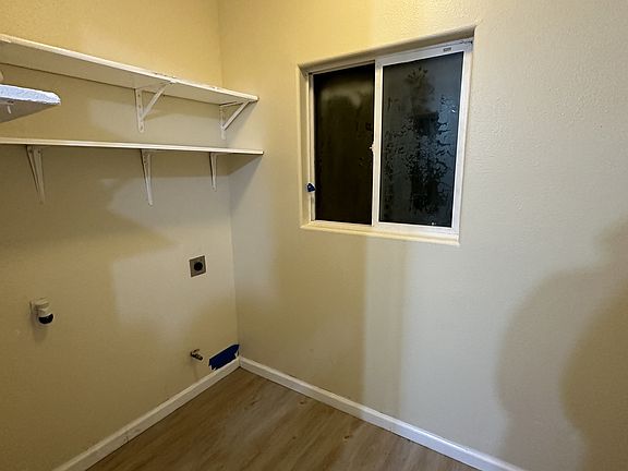 Laundry room with new floor/paint