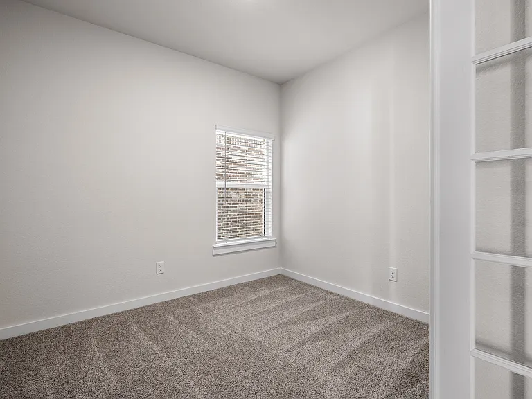 The versatile flex room sits right off of the living room.