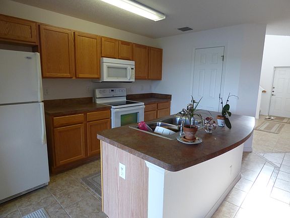 4th image of 5077 NW Coventry Cir