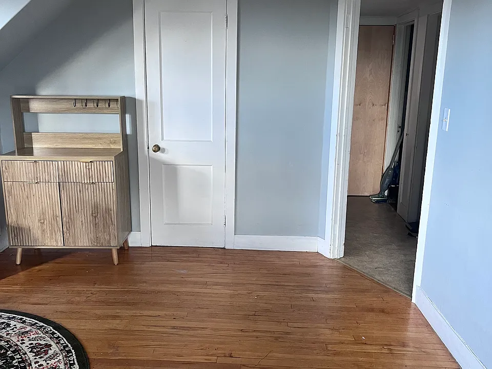 living room looking towards kitchen and bathroom
