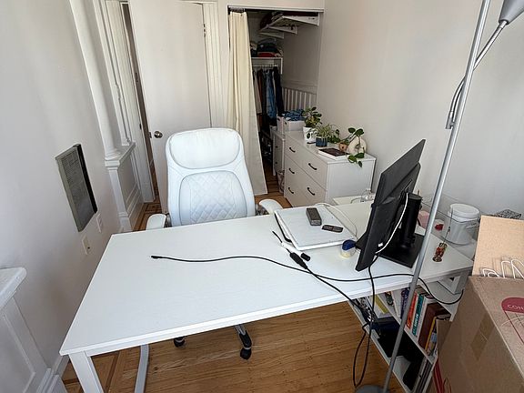 Shared smaller bedroom which can be used for storage or work-from-home office