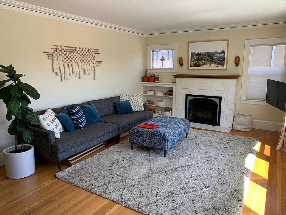 Bright living room right off the main entrance and adjacent to the dining room