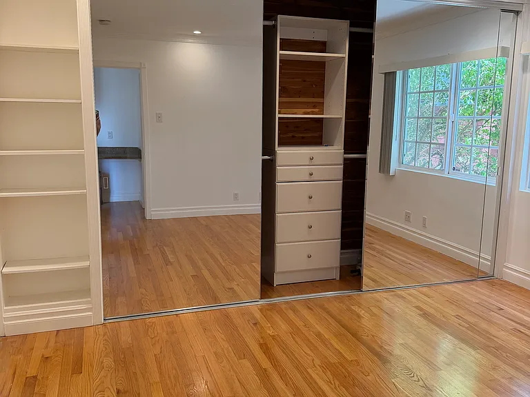 BUILT IN DRAWERS AND SHELVES. CEDAR LINED CLOSET