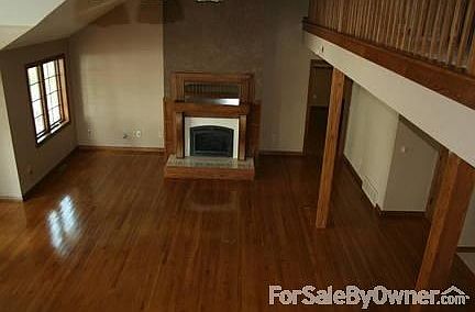 Great Room
						:
						Great Room with fireplace and hardwood floors. Open stairway to 3rd floor.