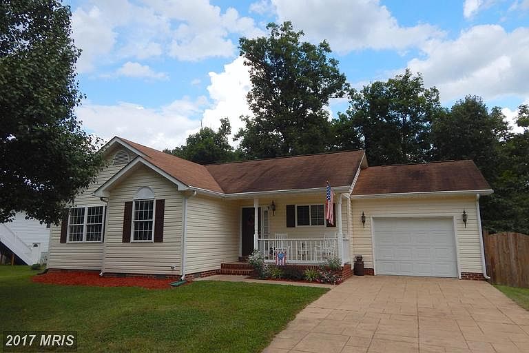 Front Porch, Stamped Concrete Drive, Garage, Fence
