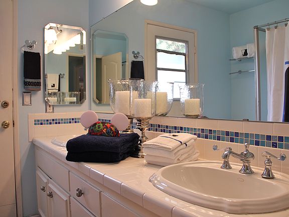 Hall bath w/ double sinks.