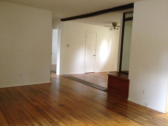 living room and dining room with coat closet