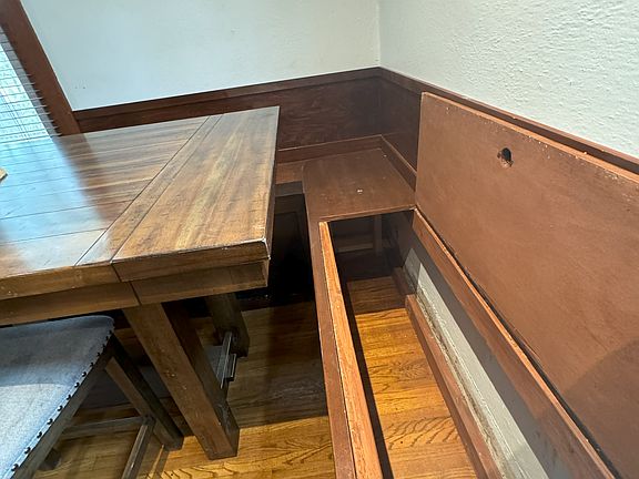 Storage in benches in dining room