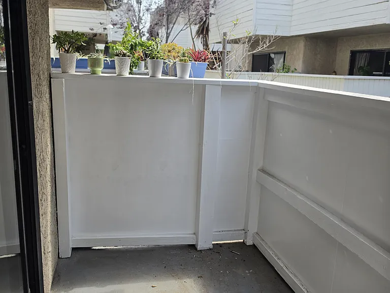 Sunny little enclosed patio