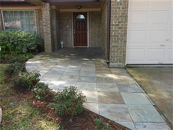 The slate entryway makes for an impressive entrance!