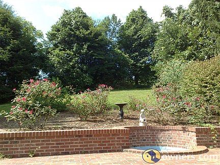 Back yard fountain and gardens.
