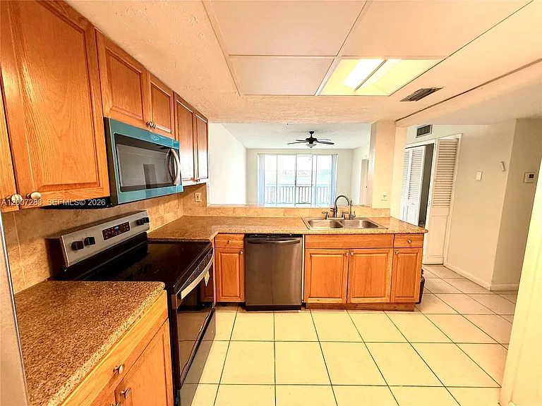 1591 NE Miami Gardens Dr #205 — Photo 12