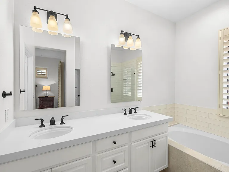 PRIMARY BATHROOM - DUAL VANITY + TUB