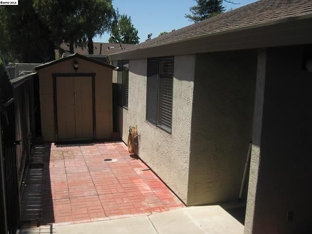 Patio with storage shed