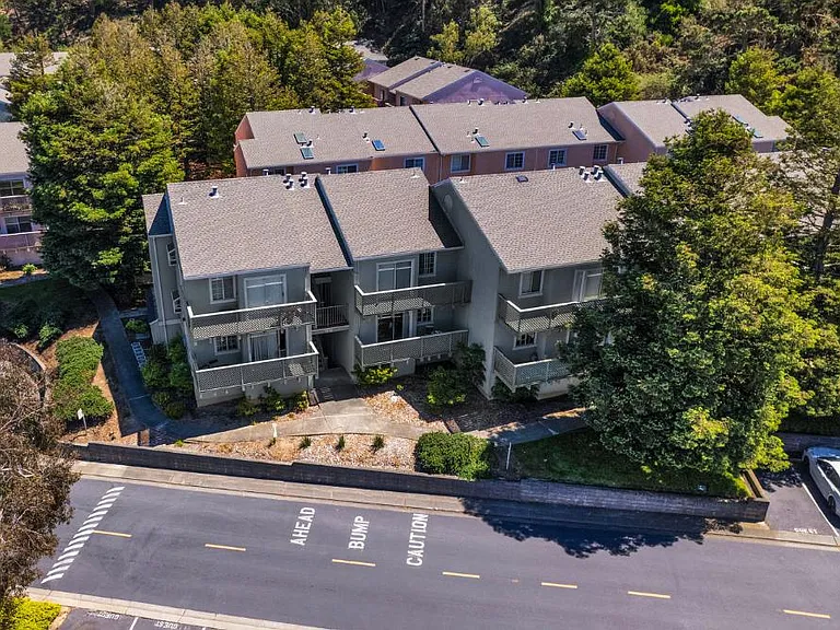 Exterior complex shows guest parking