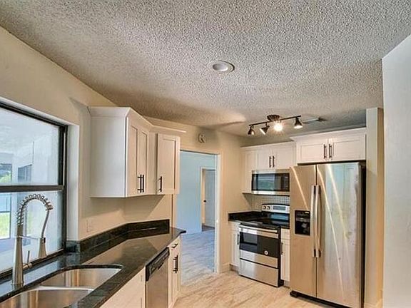 3rd image of 7720 Gibraltar Ct N