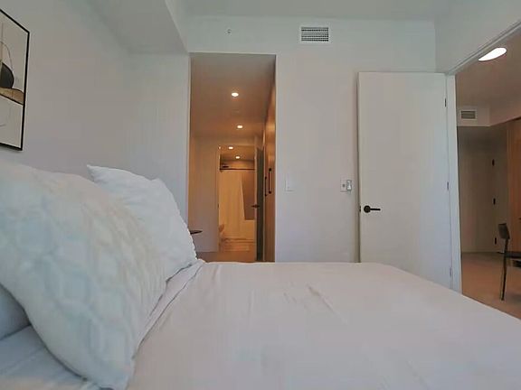 Clean Furnished Bedrooms With Views of Miami