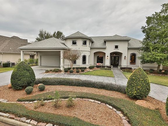 CIRCULAR DRIVEWAY-THREE CAR GARAGE - Great curb appeal and classy elevation with a large double carport and plenty of parking off the street.