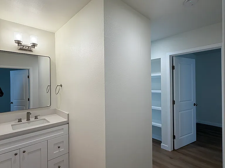 Bathroom vanity, and hallway