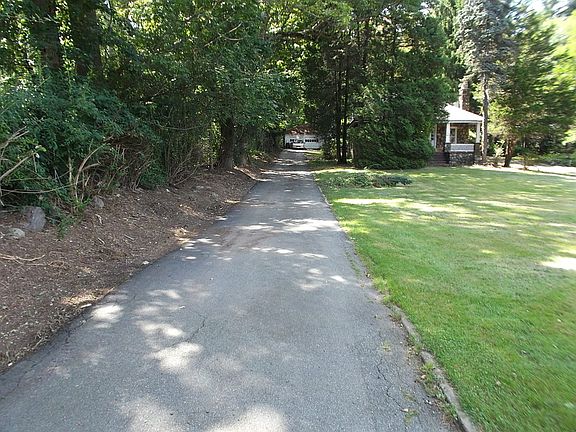 Driveway on left side  of House