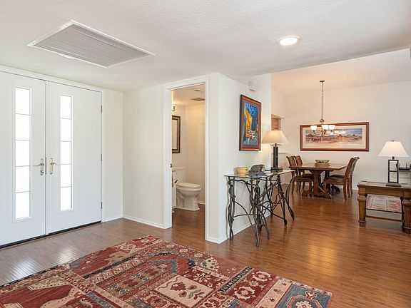 Grand entrance with guest bath off to the side