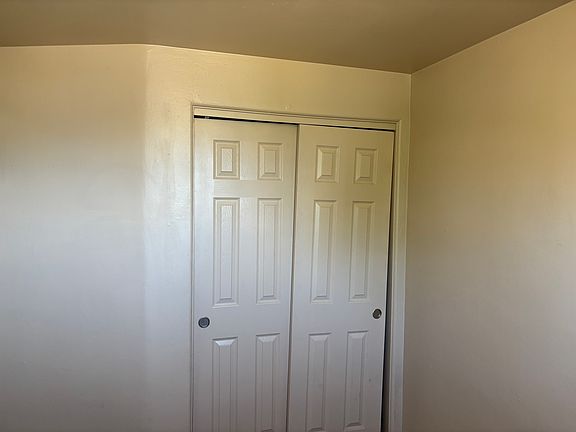 Main bedroom. All are nice size with two large windows.