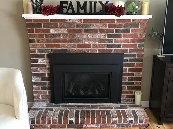 Newer propane fireplace capable of heating the whole house.