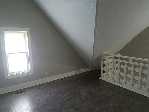 Step into this charming space at LS Capital Group, featuring unique architectural angles and abundant natural light. Ideal for personal touches, this room offers comfort and potential. Don't miss your chance. Schedule a tour today!