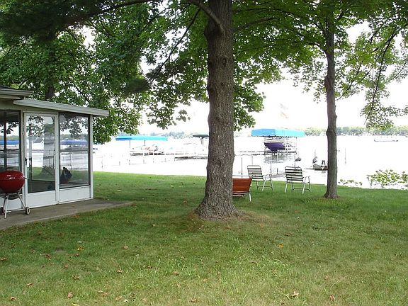Huge side yard view of lake