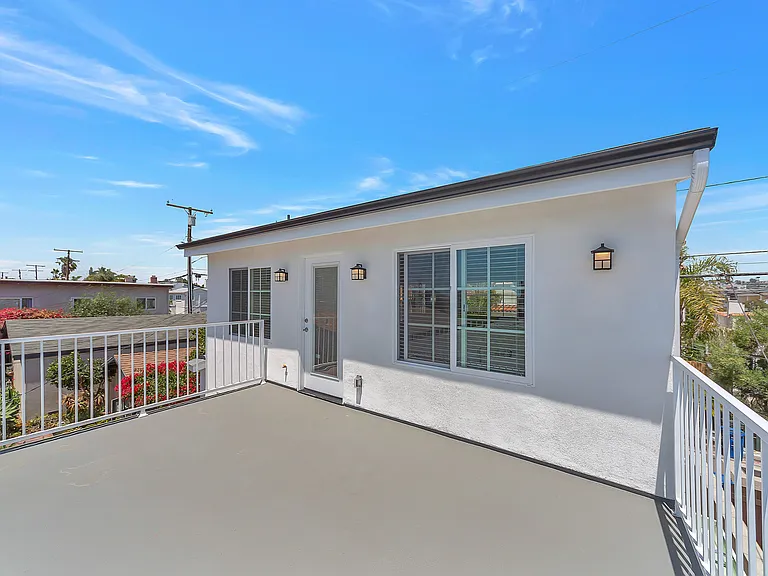 Private ocean-view deck perfect for outdoor dining and entertaining.