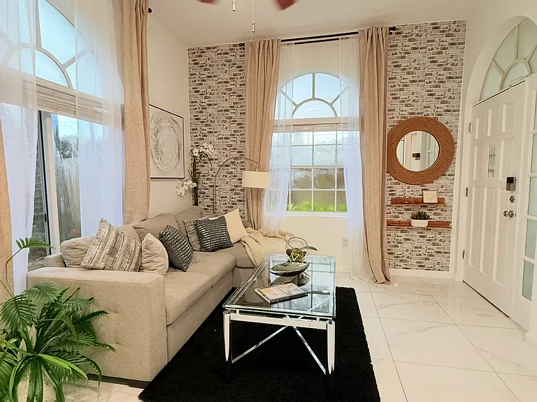 Living Room with couch that can be converted to full bed