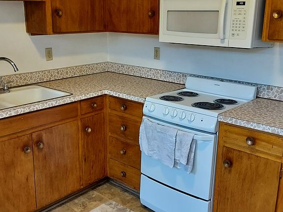 Kitchen with built-in micro wave.