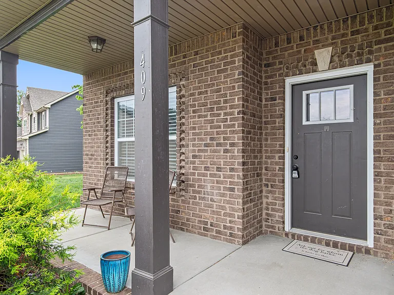 Covered front porch is a great place to relax