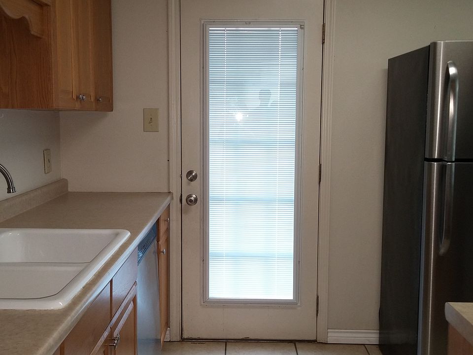 Kitchen backdoor leading to huge backyard