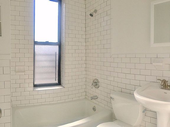 5th image of 921 E 179th St APT A