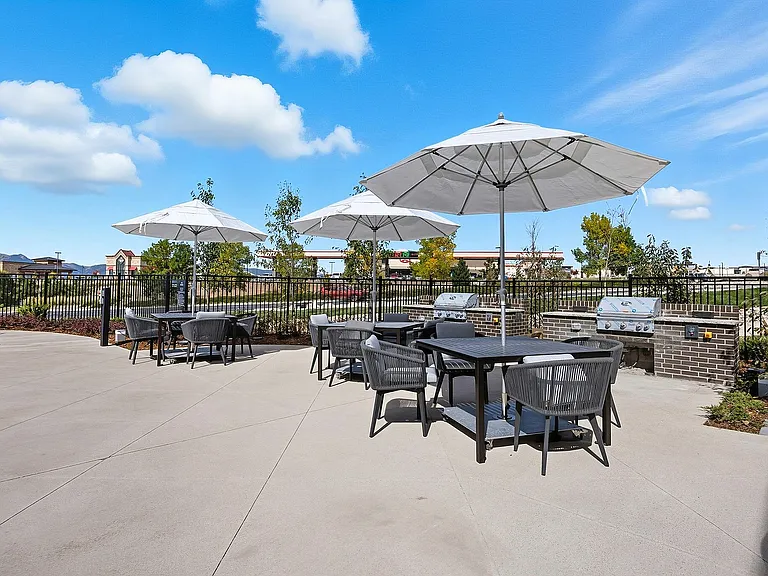 Fire up the grill and enjoy outdoor dining steps from your front door