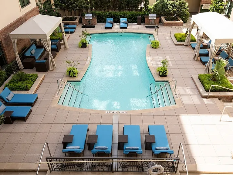 Seasonally Heated Pool with Cabanas and BBQ Grills