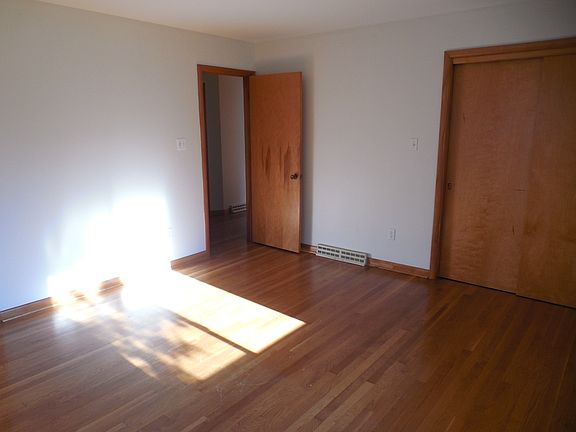 Nice Size Owners Bedroom With Hardwood Floors